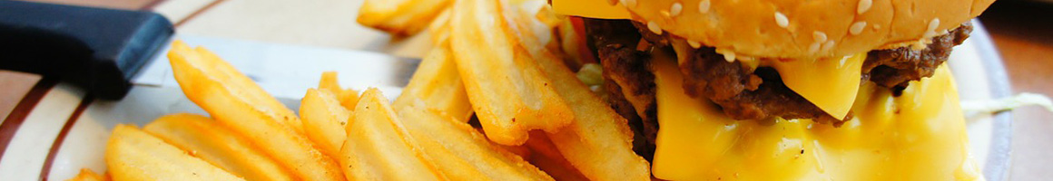 Eating American (Traditional) Burger at Shake Foundation restaurant in Santa Fe, NM.